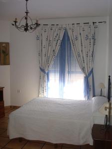 Postel nebo postele na pokoji v ubytování Hotel Restaurante El Duque