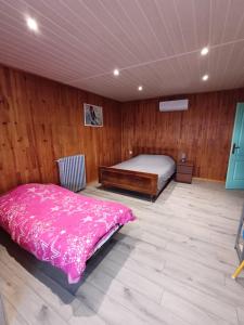 Postel nebo postele na pokoji v ubytování Le Pouyet