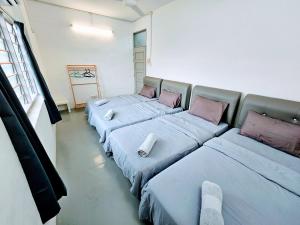 Postel nebo postele na pokoji v ubytování PANCHOR 6 HOSTEL