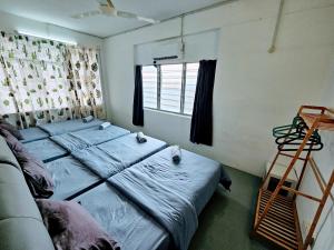 Postel nebo postele na pokoji v ubytování PANCHOR 6 HOSTEL