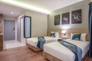 En eller flere senge i et værelse på Blue Rabbit Hotel + 35 billeder