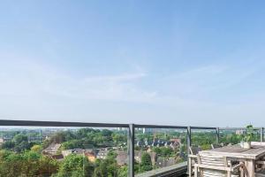 a view from the balcony of a house at Alpine Hotel by SnowWorld in Landgraaf