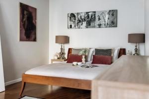 Postel nebo postele na pokoji v ubytování Piedmont Apartment - LoftAffair
