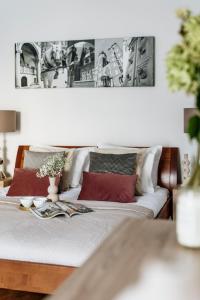 Postel nebo postele na pokoji v ubytování Piedmont Apartment - LoftAffair