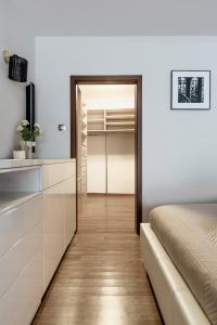 Postel nebo postele na pokoji v ubytování Piedmont Apartment - LoftAffair