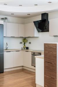 Kuchyň nebo kuchyňský kout v ubytování Piedmont Apartment - LoftAffair
