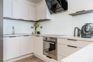 Kuchyň nebo kuchyňský kout v ubytování Piedmont Apartment - LoftAffair