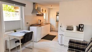 Kuchyň nebo kuchyňský kout v ubytování Apartment Fabio