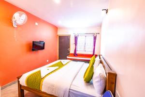 Postel nebo postele na pokoji v ubytování SV RESIDENCY