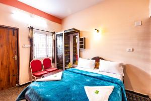 Postel nebo postele na pokoji v ubytování SV RESIDENCY