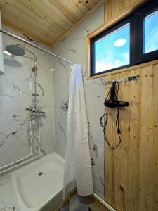 Imagen de la galería de Nest House, en Tong