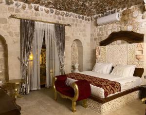 Postel nebo postele na pokoji v ubytování Antik Han Otel Mardin + 37 fotografií