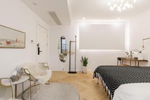 Ένα ή περισσότερα κρεβάτια σε δωμάτιο στο Shanghai ruochu designer Guesthouse上海若初设计师民宿--近上海浦东国际机场及迪士尼