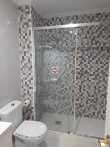 Un baño de El Parque 4 dormitorios wifi playa centro