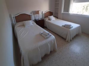 Cama o camas de una habitación en El Parque 4 dormitorios wifi playa centro