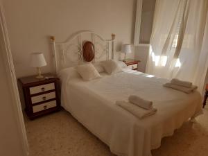 Cama o camas de una habitación en El Parque 4 dormitorios wifi playa centro