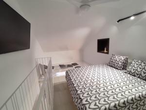 A bed or beds in a room at Carihuela Home