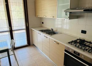 Kuchyň nebo kuchyňský kout v ubytování Casa Meja Apartment
