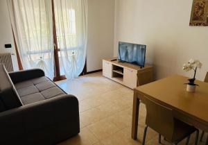 TV a/nebo společenská místnost v ubytování Casa Meja Apartment