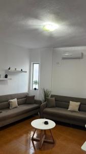 Posezení v ubytování Peçi Apartments Gjirokastër