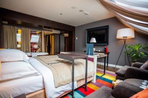Posteľ alebo postele v izbe v ubytovaní Hotel Bristol Tradition and Luxury