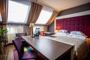 Posteľ alebo postele v izbe v ubytovaní Hotel Bristol Tradition and Luxury