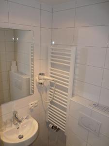 Koupelna v ubytování Hotel Edelweiß