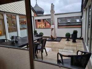 Μπαλκόνι ή βεράντα στο Ferienwohnungen Springer in Schönefeld OT Großziethen div Apartments für bis zu 6 Personen +75 φωτογραφίες