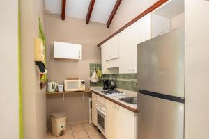 Kuchyň nebo kuchyňský kout v ubytování Villa Vanille - Maison avec piscine partagée