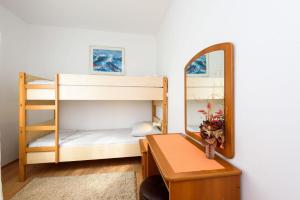 Postel nebo postele na pokoji v ubytování Apartments Goge