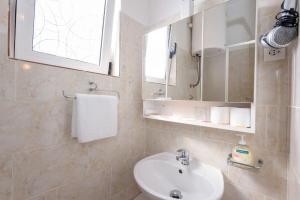 Koupelna v ubytování Apartments Goge