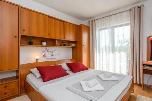 Posteľ alebo postele v izbe v ubytovaní Apartments Goge