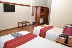 Katil atau katil-katil dalam bilik di Bagan Thiripyitsaya Sanctuary Resort