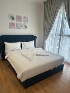 Postel nebo postele na pokoji v ubytování Luxury Suite at Quill Residences + 37 fotografií
