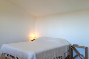 Ένα ή περισσότερα κρεβάτια σε δωμάτιο στο Bright T2 near city center