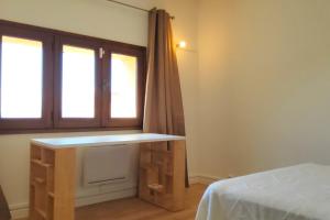 Ένα ή περισσότερα κρεβάτια σε δωμάτιο στο Bright T2 near city center