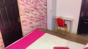 Postel nebo postele na pokoji v ubytování Autograph Apartment