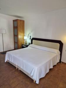 Ein Bett oder Betten in einem Zimmer der Unterkunft Hotel Restaurante Setos