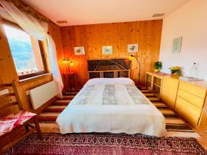 Postel nebo postele na pokoji v ubytování Artemisia B&B