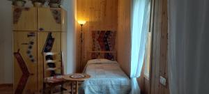 Postel nebo postele na pokoji v ubytování Artemisia B&B
