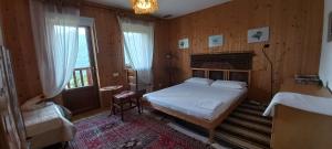 Postel nebo postele na pokoji v ubytování Artemisia B&B