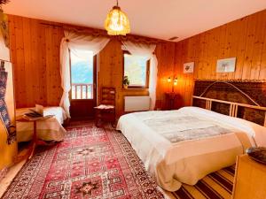 Postel nebo postele na pokoji v ubytování Artemisia B&B
