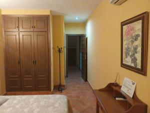 A bed or beds in a room at La Garzona