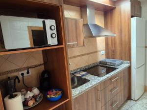 Kuchyň nebo kuchyňský kout v ubytování La Casita del Arco de San Andrés