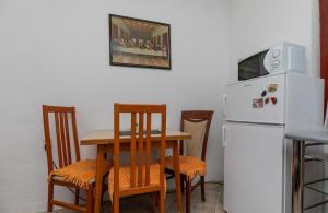 Kuchyň nebo kuchyňský kout v ubytování Apartments Duro