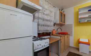 Kuchyň nebo kuchyňský kout v ubytování Apartments Duro