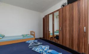 Postel nebo postele na pokoji v ubytování Apartments Duro