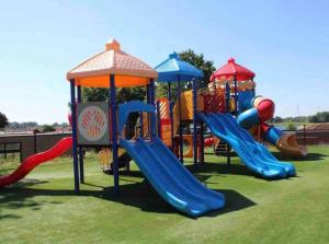 a group of playground equipment with slides and slidesktop at LUXUS Cube in Lathum, nähe Arnheim in Lathum