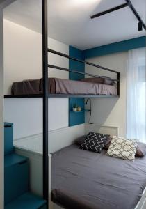 Una cama o camas en una habitación de Apartman Petica Divčigora