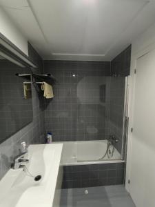 A bathroom at Marenia, dúplex en primera línea de playa